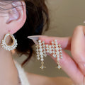 Light Luxury Geometric Star Zircon Faux Pearl Tassel Stud Earrings For Elegant Women view 1