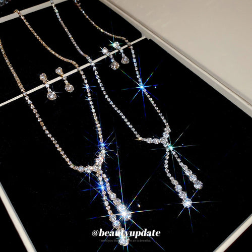 Light Luxury Iron Jewelry Set With Rhinestone Round Pendant Necklace And Tassel Earrings