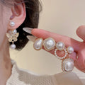 Light Luxury Geometric Faux Pearl Cat Eye Rhinestone Stud Earrings Jewelry Set view 2