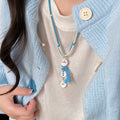 Light Luxury Velvet Cord Snowman Tassel Sweater Necklace With Round Geometric Charm view 3