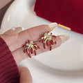 Elegant Red Enamel Fireworks Flower Studs With Gold Alloy Petals And Sparkling Rhinestone Accents Earrings view 2