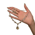 Light Luxury Iron Rhinestone Flower Stud Earrings Necklace Jewelry Set For Women view 5