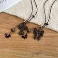 Light Luxury Maillard Wood Sweater Necklace With Enamel Leopard Bow Cross Pendant For Women view 4