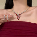 Light Luxury Iron Rhinestone Oval Tassel Necklace And Stud Earrings Jewelry Set For Women view 1