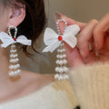 Chic Rhinestone Bow Faux Pearl Stud Earrings With Silver Needle Posts For Women view 3