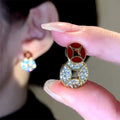 Light Luxury Copper Coin Stud Earrings With Enamel Drip Oil Zircon Round Geometric Retro Chinese Style view 2