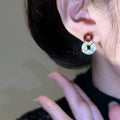 Light Luxury Copper Coin Stud Earrings With Enamel Drip Oil Zircon Round Geometric Retro Chinese Style view 3
