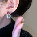 Light Luxury Copper Coin Stud Earrings With Enamel Drip Oil Zircon Round Geometric Retro Chinese Style view 4