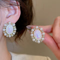 Oval Faux Pearl Stud Earrings With Rhinestone Accents, Vintage Light Luxury Geometric Style view 1