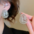 Gold Plated Copper Zircon Oval Hollow Geometric Stud Earrings For Casual Elegant Commute Style view 3