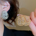 Gold Plated Copper Zircon Oval Hollow Geometric Stud Earrings For Casual Elegant Commute Style view 1