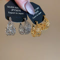 Real Gold Plated Metal Hollow Flower U-Shaped Earrings French Vintage Light Luxury Style view 4