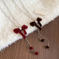 Light Luxury Copper Zircon Flocked Bow Pendant Sweater Necklace For Women view 2
