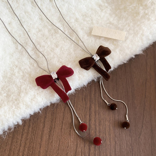 Light Luxury Copper Zircon Flocked Bow Pendant Sweater Necklace For Women