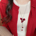 Light Luxury Copper Zircon Flocked Bow Pendant Sweater Necklace For Women view 3