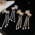 Court Style Bow Tassel Drop Earrings With Zircon Accents And Faux Pearl Dangles view 2