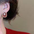 Chic Retro Alloy Silver Needle Oval Pearl Firework Flower Stud Earrings With Oil Drip Finish view 4