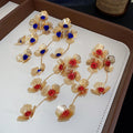 Retro Elegant Iron Hollow Flower Tassel Drop Earrings For Women Light Luxury Statement Design view 2