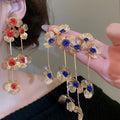Retro Elegant Iron Hollow Flower Tassel Drop Earrings For Women Light Luxury Statement Design view 1