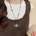 Light Luxury Alloy Leather Enamel Cat Paw Dog Sweater Necklace For Women view 3