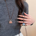 Light Luxury Alloy Leather Enamel Cat Paw Dog Sweater Necklace For Women view 1