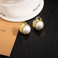 Elegant Vintage Round Faux Pearl Gold Alloy Drop Earrings For Women French Light Luxury Earrings view 4