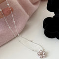 French Old Money Faux Pearl Necklace With Round Beads And Floral Geometric Design view 4