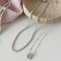 French Old Money Faux Pearl Necklace With Round Beads And Floral Geometric Design view 2