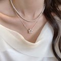 French Old Money Faux Pearl Necklace With Round Beads And Floral Geometric Design view 3