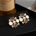 Elegant Pearl Rhinestone Hollow Flower Geometric Enamel Alloy Stud Earrings view 4