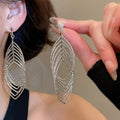 Light Luxury Iron Zircon Oval Hollow Geometric Clip-on Earrings for Women view 3