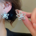 Copper Zircon Hollow Star Stud Earrings Minimalist Light Luxury Fashion Ear Jewelry view 1
