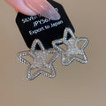Copper Zircon Hollow Star Stud Earrings Minimalist Light Luxury Fashion Ear Jewelry view 2