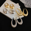 Light Luxury Smooth Iron Metal Oval Hoop Earrings Minimalist Geometric Fashion Jewelry view 1