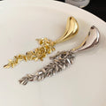 Light Luxury Geometric Iron Brooch With Metal Tassel Vintage Elegant Women's Clothing Pin view 2