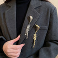Light Luxury Geometric Iron Brooch With Metal Tassel Vintage Elegant Women's Clothing Pin view 1
