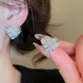 Gold Plated Copper Heart Zircon Stud Earrings With Silver Needle Posts, Minimalist Light Luxury Style view 3