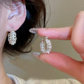 Elegant Hollow Round Faux Pearl Earrings Minimalist Geometric Luxury Style view 1