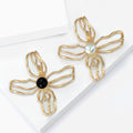 Alloy Rhinestone Hollow Camellia Brooch For Coat And Suit Decoration view 3
