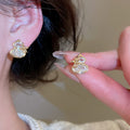 Light Luxury Gold Plated Copper Zircon Gourd Stud Earrings With Silver Posts view 1