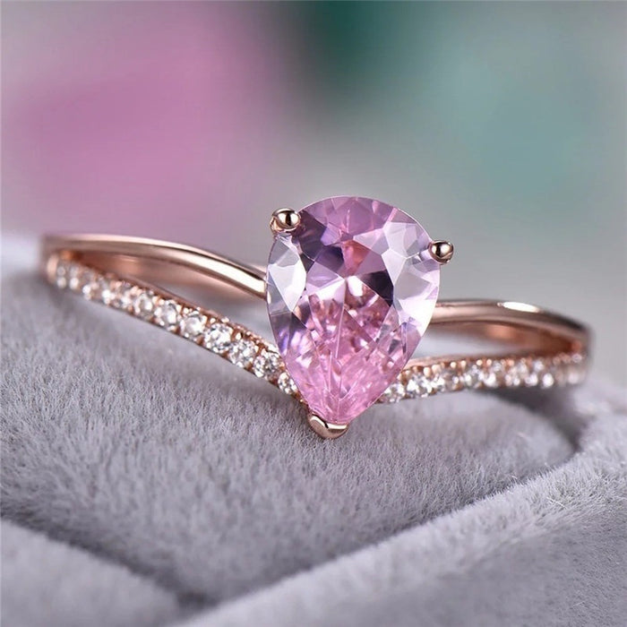 Rose Gold-Tone Pink Pear Ring With V-Shaped Crystal Band