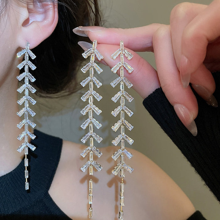 Light Luxury Copper Zircon Leaf Tassel Drop Earrings For Women With Silver Needle Studs