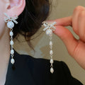 Rhinestone Bow Faux Pearl Tassel Drop Earrings With Silver Needle Posts, Playful Geometric Style view 1