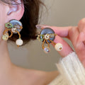Ethnic Vintage Round Coconut Shell Wood Bead Stud Earrings With Silver Needle Geometric Design view 1