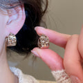 Light Luxury Vintage Copper Teardrop Earrings With Rhinestone Hollow Oval Design view 3