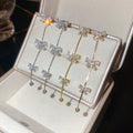 Gold Plated Copper Bow Tassel Drop Earrings With Silver Posts And Zircon Accents view 3