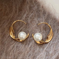 Twisted Stripe Round Faux Pearl Stud Earrings For Women Vintage Geometric Light Luxury Style view 1