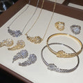 Light Luxury Copper Zircon Feather Jewelry Set With Bracelet Ring Earrings And Necklace view 1