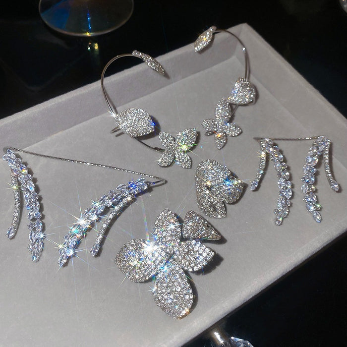 Light Luxury Zircon Leaf Flower Copper Jewelry Set With Bracelet Earrings Ring Tassel