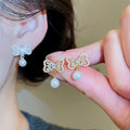 Gold Plated Silver Needle Zircon Bow Faux Pearl Stud Earrings French Elegant Light Luxury Jewelry view 1